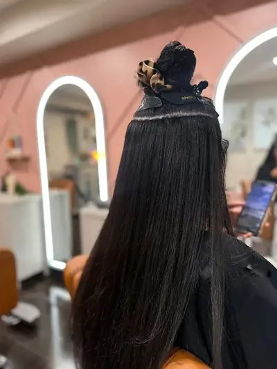 Hair extensions by Kirra Davis