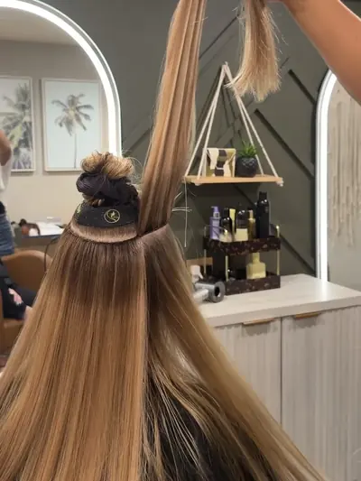 Hair extensions by Kirra Davis