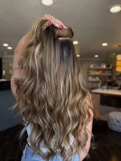 Hair extensions by Kirra Davis